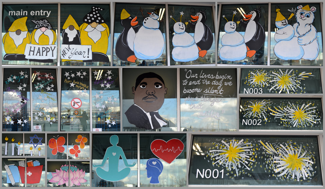 January Window Paintings at the Amazon CDW5 Warehouse in Carteret, Middlesex County, NJ, featuring New Year, Martin Luther King, Jr. Day, Holocaust Remembrance Day, Pharmacist Day, Celebration of Life, Mahayana New Year, and Mind-Body-Wellness Day