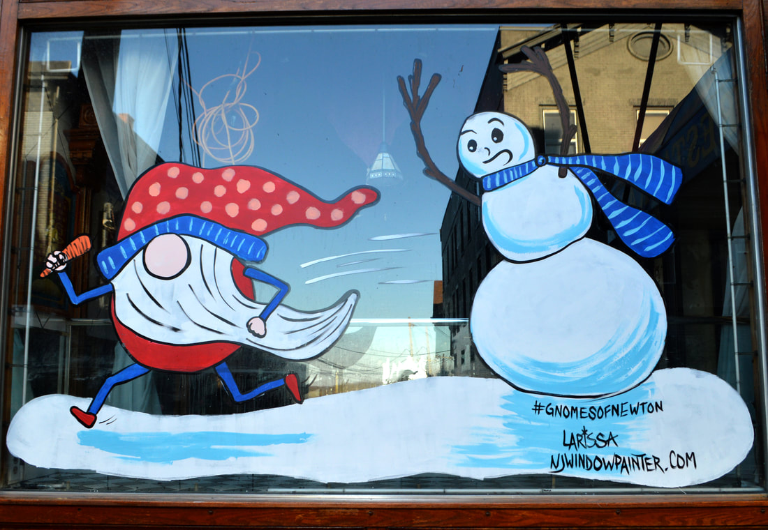 Winter Window Painting in Newton, Sussex County, NJ featuring a Gnome Stealing a Snowman's Carrot Nose
