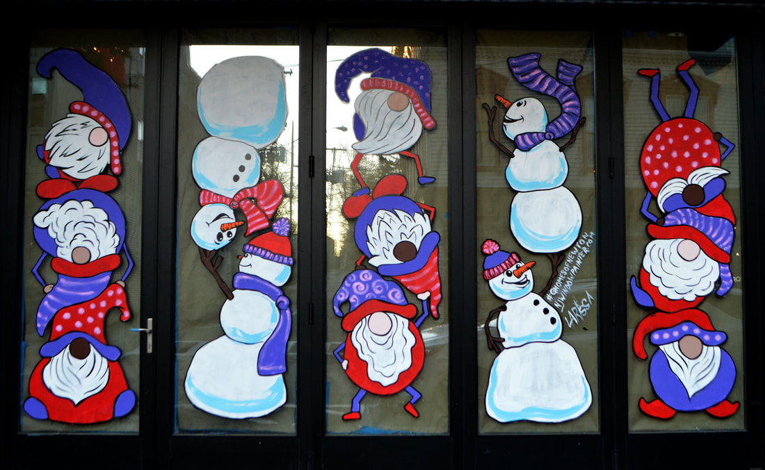 Winter Window Art in Newton, Sussex County, NJ featuring Stacked Gnomes and Snowmen Wearing Purple and Red