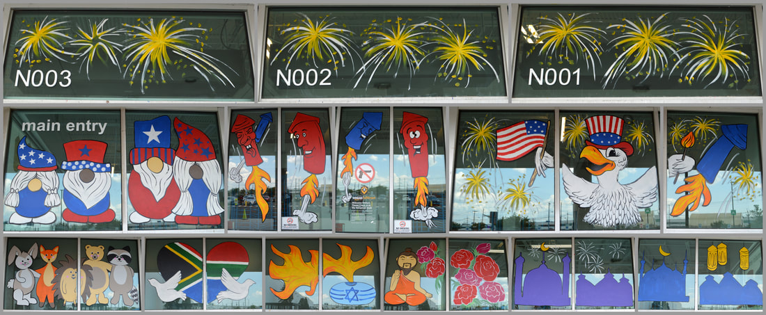 July Window Paintings at Amazon CDW5 Warehouse in Carteret, Middlesex County, NJ featuring Independence Day, International Friendship Day, International Nelson Mandela Day, Tisha B'Av, Guru Purnima, Islamic New Year, and Eid al-Adha