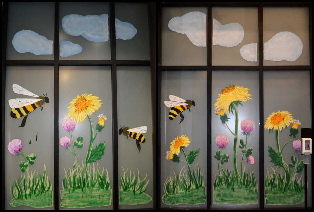 Spring Window Painting at the LGA5 Amazon Warehouse in Edison, Middlesex County, NJ, featuring Dandelions, Clover, and Honey Bees