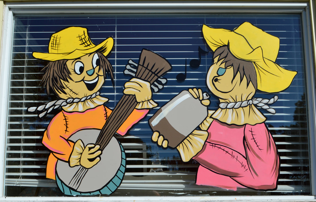 Autumn Residential Window Painting in Wayne, Passaic County, NJ featuring scarecrow musicians