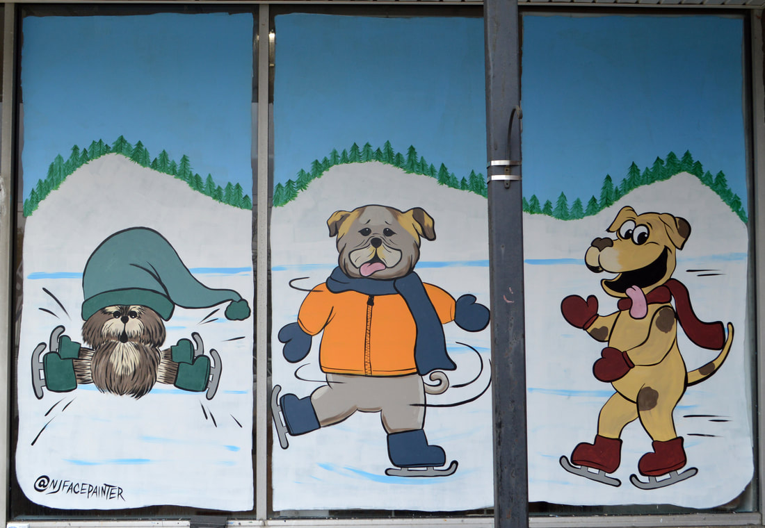 Winter Window Art at FurEver Friends Pet Spa in Bardonia, Rockland County, NY featuring ice skating dogs
