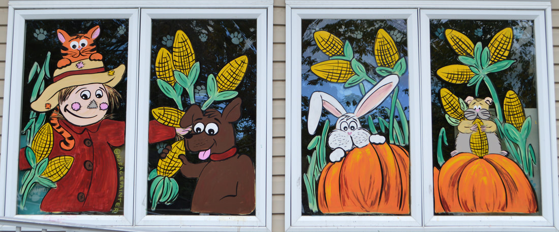 Fall Window Painting at Maywood Vet in Maywood, Bergen County, NJ featuring pets in a cornfield