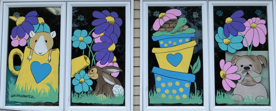Spring Windows at the Maywood Veterinary Hospital in Maywood, Bergen County, NJ featuring a guinea pig, dog, turtle, and rabbit