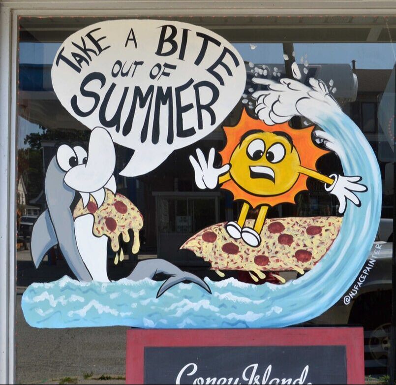 Summer Window Art at Coney Island Pizza in Riverdale, Passaic County, NJ featuring a sun surfing on a pizza surfboard and a shark eating the pizza